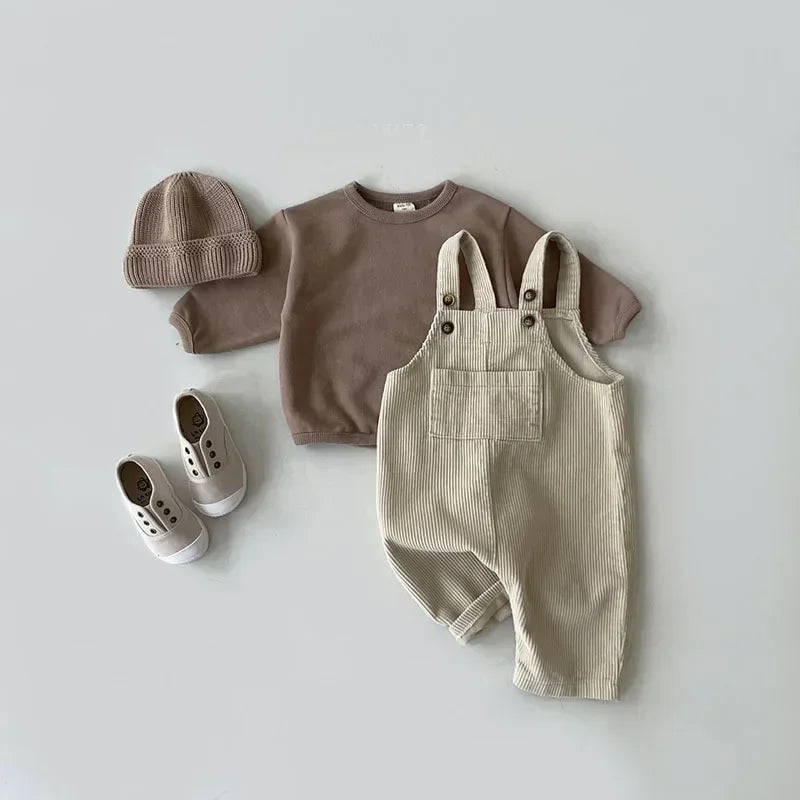 2025 Vêtements pour nouveau-né Combinaison en velours côtelé pour garçon Combinaisons d’automne et d’hiver Barboteuse pour fille Pantalon à bavoir décontracté Salopette Vêtements pour bébés