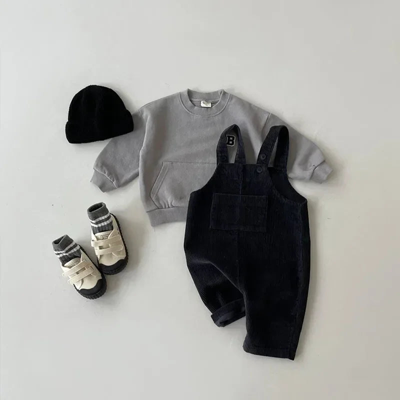 2025 Vêtements pour nouveau-né Combinaison en velours côtelé pour garçon Combinaisons d’automne et d’hiver Barboteuse pour fille Pantalon à bavoir décontracté Salopette Vêtements pour bébés